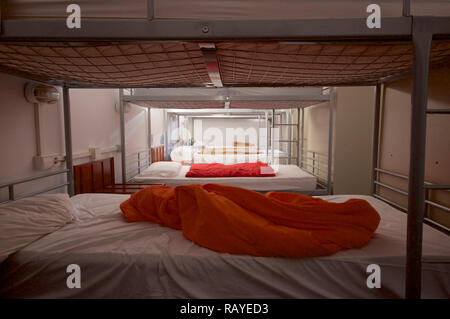 Bunk beds in a dorm room Stock Photo