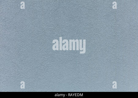 Light blue color, plaster paint wall texture background. Exterior facade of a residential building Stock Photo