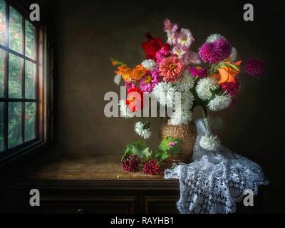 Still life with mixed bouquet of autumn flowers Stock Photo