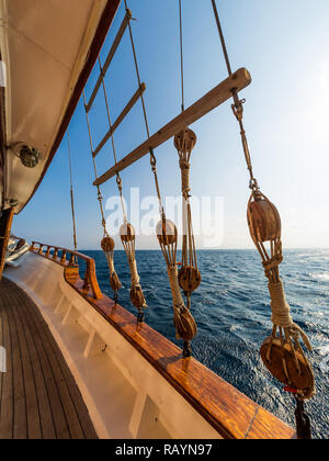 Old ship tackles. Old sailing ship vessel. Background Stock Photo