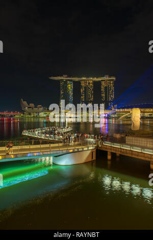 SINGAPORE CITY, SINGAPORE - APRIL 15, 2018: Marina Bay Sands at night the largest hotel in Asia. It opened on 27 April 2010. Singapore on April 15, 20 Stock Photo