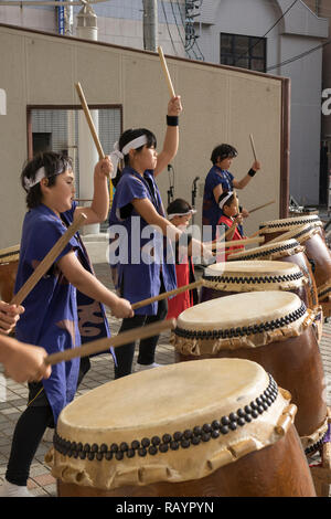 Sasebo, Japan - October 27, 2018: Children taiko drumming band giving a performance in Sasebo, Japan Stock Photo