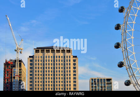 Millennium Wheel / London Eye with Shell centre and buildings on the South Bank, London, England, UK. Stock Photo