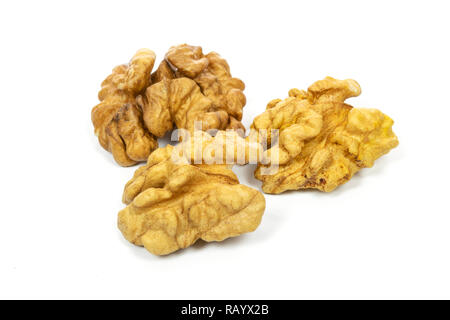 Dry and shelled walnuts isolated on a white background Stock Photo