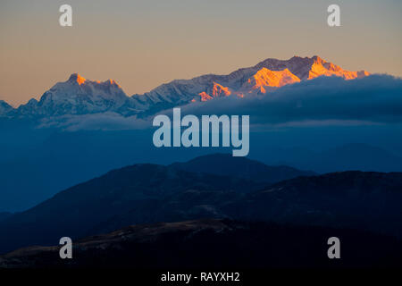 Dramatic landscape Kangchenjunga mountain with colorful from sunlight at Sandakphu, north of India Stock Photo