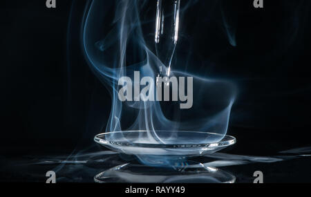 chemical reaction: fog with ammonia and muriatic acid Stock Photo