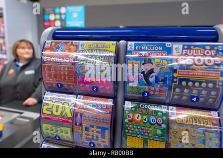 National lottery scratch cards on sale in a supermarket shop in the UK. Stock Photo