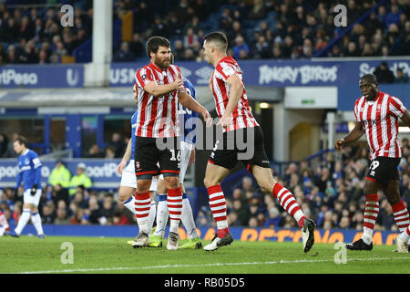 Goodison park, UK. 5th January 2019. Michael Bostwick of Lincoln City (16) celebrates with his teammates after scoring his teams 1st goal to make it 2-1. The Emirates FA cup, 3rd round match, Everton v Lincoln City at Goodison Park in Liverpool on Saturday 5th January 2019.  this image may only be used for Editorial purposes. Editorial use only, license required for commercial use. No use in betting, games or a single club/league/player publications.  Credit: Andrew Orchard sports photography/Alamy Live News Stock Photo