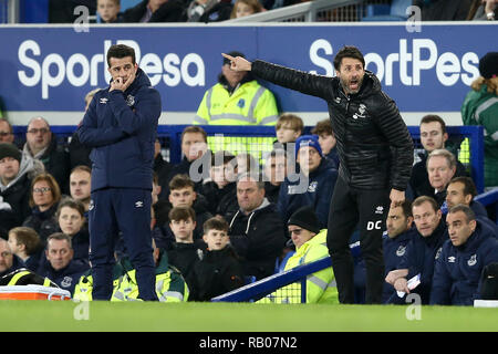 Liverpool, UK. 5th Jan 2019. Lincoln City Manager Danny Cowley (r) shouts his  instructions to his players while Everton Manager Marco Silva (l) looks on. The Emirates FA cup, 3rd round match, Everton v Lincoln City at Goodison Park in Liverpool on Saturday 5th January 2019.  this image may only be used for Editorial purposes. Editorial use only, license required for commercial use. No use in betting, games or a single club/league/player publications. pic by Chris Stading/Andrew Orchard sports photography/Alamy Live news Stock Photo