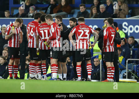 Liverpool, UK. 5th Jan 2019. Lincoln players receive instructions from their manager Danny Cowley (c) during a break in play. The Emirates FA cup, 3rd round match, Everton v Lincoln City at Goodison Park in Liverpool on Saturday 5th January 2019.  this image may only be used for Editorial purposes. Editorial use only, license required for commercial use. No use in betting, games or a single club/league/player publications. pic by Chris Stading/Andrew Orchard sports photography/Alamy Live news Stock Photo