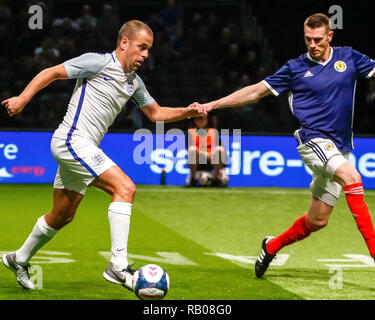 Glasgow, UK. 5th Jan 2019. Action from Day 2 of the FansBet Star Sixes Tournament at the SSE Hydro in Glasgow.   Game 6 - England Vs Scotland Joe Cole in possession during the Star Sixes Tournament in Glasgow Credit: Colin Poultney/Alamy Live News Stock Photo