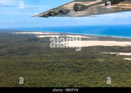 View of massive sand dunes on Fraser Island from inside a plane / from above (Queensland, Australia) Stock Photo