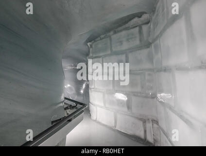 Jungfrau, Switzerland - Oct 20, 2018. Walking tunnel at the Ice Palace of Jungfraujoch Station (Switzerland). Stock Photo