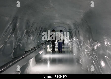 Jungfrau, Switzerland - Oct 20, 2018. Walking tunnel at the Ice Palace of Jungfraujoch Station (Switzerland). Stock Photo