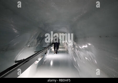 Jungfrau, Switzerland - Oct 20, 2018. Walking tunnel at the Ice Palace of Jungfraujoch Station (Switzerland). Stock Photo