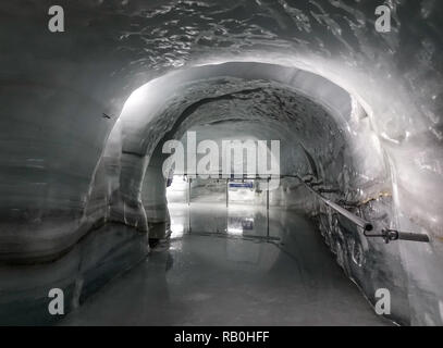 Jungfrau, Switzerland - Oct 20, 2018. Walking tunnel at the Ice Palace of Jungfraujoch Station (Switzerland). Stock Photo