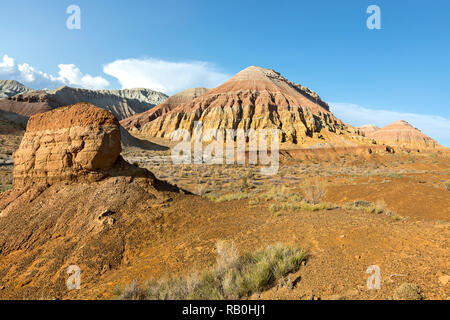 Rock formations and extreme terrain in the Aktau Mountains known also as White Mountains, in Kazakhstan Stock Photo