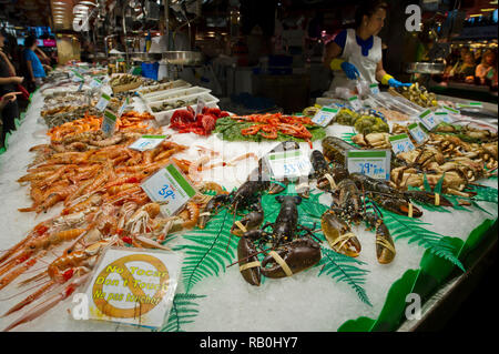 Seafood on display at the Mercat de Sant Josep de la Boqueria (known as La Boqueria) indoor market in Barcelona, Spain Stock Photo