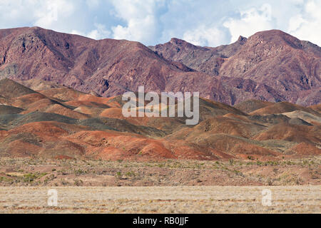 Rock formations and extreme terrain in the Aktau Mountains known also as White Mountains, in Kazakhstan Stock Photo