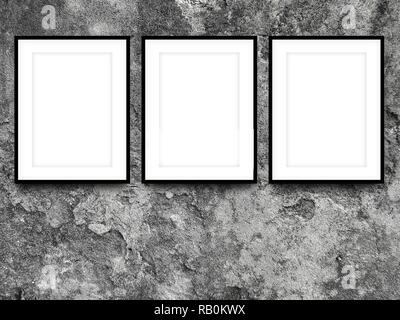 Three blank black picture frames on gray weathered concrete wall background Stock Photo