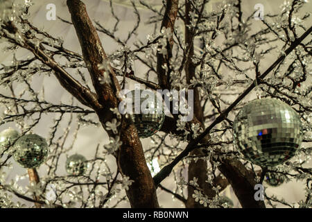 Garden decoration during the Christmas season.Mirror Disco Balls. Stock Photo