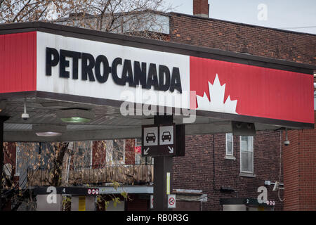 MONTREAL, CANADA - NOVEMBER 6, 2018: Petro-Canada logo in front of one of their gas stations in Canada. Belonging to Suncor Energy, petro Canada is a  Stock Photo