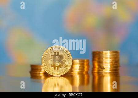 Bitcoin on world map. Cryptocurrency transactions concept Stock Photo