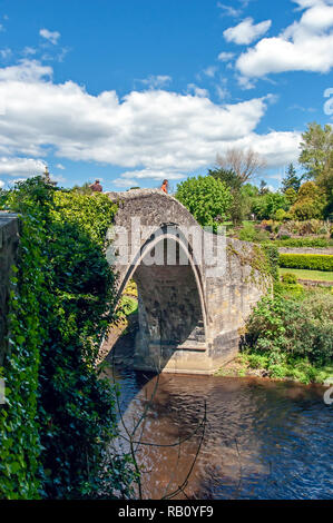 Medieval Brig O’Doon bridge spanning the River Doon at the Burns National Heritage Park in Alloway Scotland Stock Photo