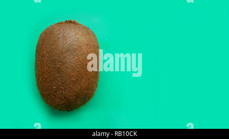 The concept of healthy eating. kiwi on blue modern and fashion background Stock Photo