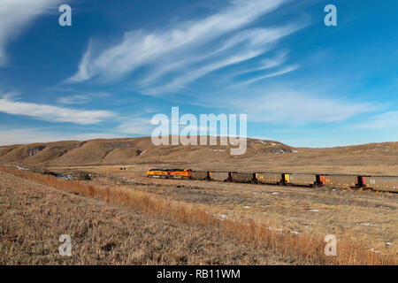 Hyannis, Nebraska - A BNSF coal train in the sand hills of Nebraska. Each day, as many as 100 coal trains, each about a mile long, deliver coal from W Stock Photo