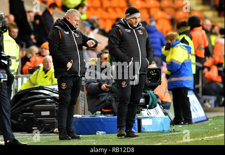 Blackpool Manager Terry McPhillips (left) and Assistant manager Gary Brabin watch the action from the touchline during the Emirates FA Cup, third round match at Bloomfield Road, Blackpool. Stock Photo