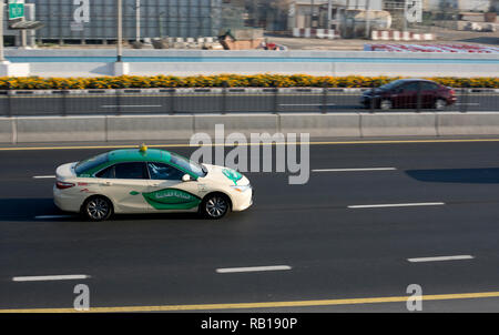 A taxi at speed, Dubai, UAE Stock Photo