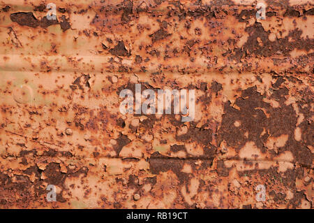 Old weathered grunge rusty metal tin surface closeup as background Stock Photo