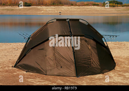 Fishing tent. Equipment for carp fishing. Stock Photo