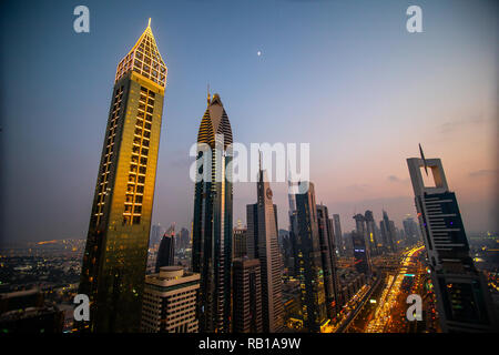 Dubai, UAE - October, 2018: View on Dubai skycrapers and traffic roads in the night Stock Photo