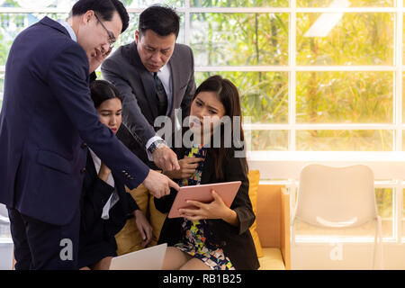 Business people having a conversation in the cafe on coffee time Stock Photo