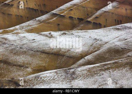 Snow Dusted, Gold and Black Clay Hills, Painted Hills Overlook, John Day National Monument, Mitchell, Oregon Stock Photo