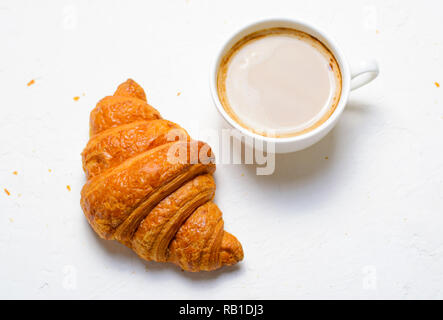 Freshly Baked Croissants and Coffee Cup on White Background Stock Photo