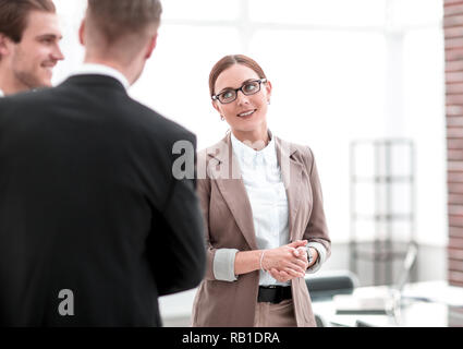 business partners meet in the office. Stock Photo