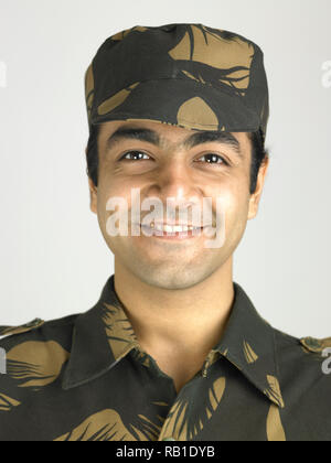 PORTRAIT OF INDIAN SOLDIER DRESSED IN UNIFORM Stock Photo