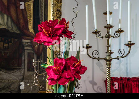 Christmas flower display at All Saints Church in East Budleigh. Stock Photo