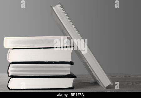 books stacked on top of each other Stock Photo