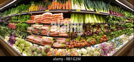 Vegetable shelves in the Whole Foods Market Stock Photo