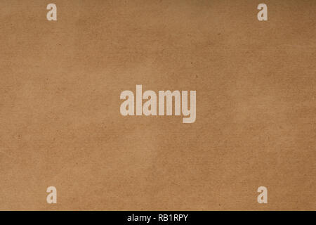 Golden brown background with light spots for text design, template, layout. Textured sheet from an old book. Horizontal image. Stock Photo