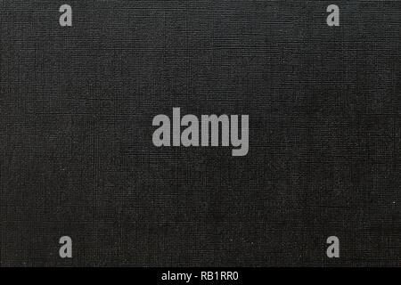 Deep black background with  grid pattern and white dots. Canvas texture of old book cover Stock Photo