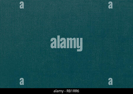 Deep blue-green background with  grid pattern and white dots. Canvas texture of old book cover. Toned image Stock Photo