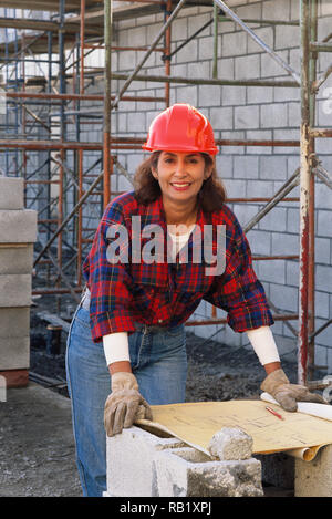 Female construction worker on site, USA Stock Photo