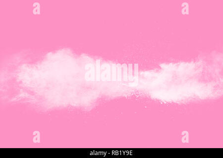 White powder explosion on pink background. Stock Photo