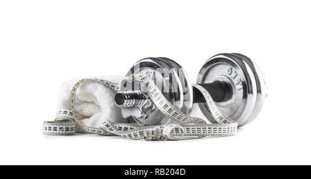 Dumbbells towel and measure tape isolated on white background. Stock Photo