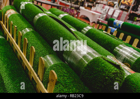 Valencia, Spain - January 3, 2019: Rolls of fake plastic grass to reform gardens. Stock Photo